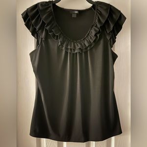 Black sleeveless top with ruffle collar and shoulders
